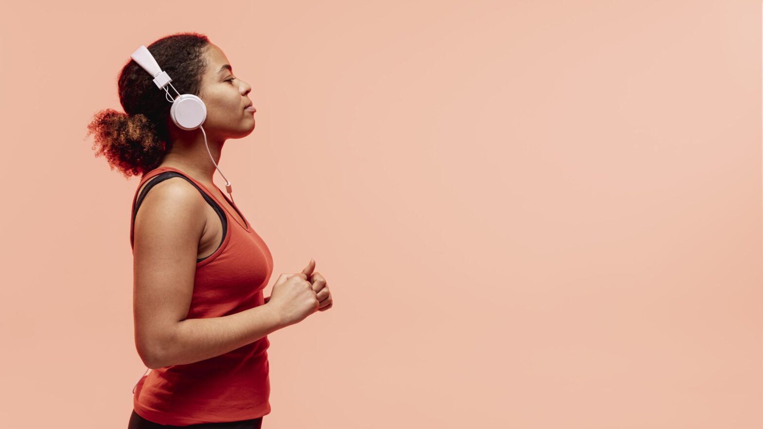 person listening to music during workout