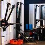 Well-equipped studio space at NXT LVL Amstelveen with cable machine and dumbbells